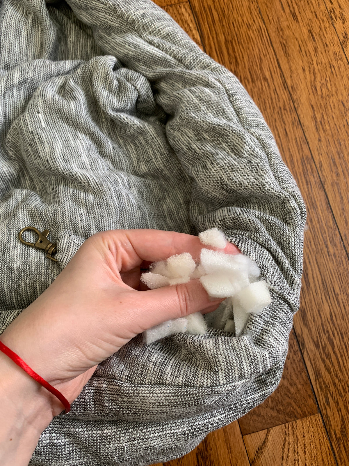 Fully padded pouch sling